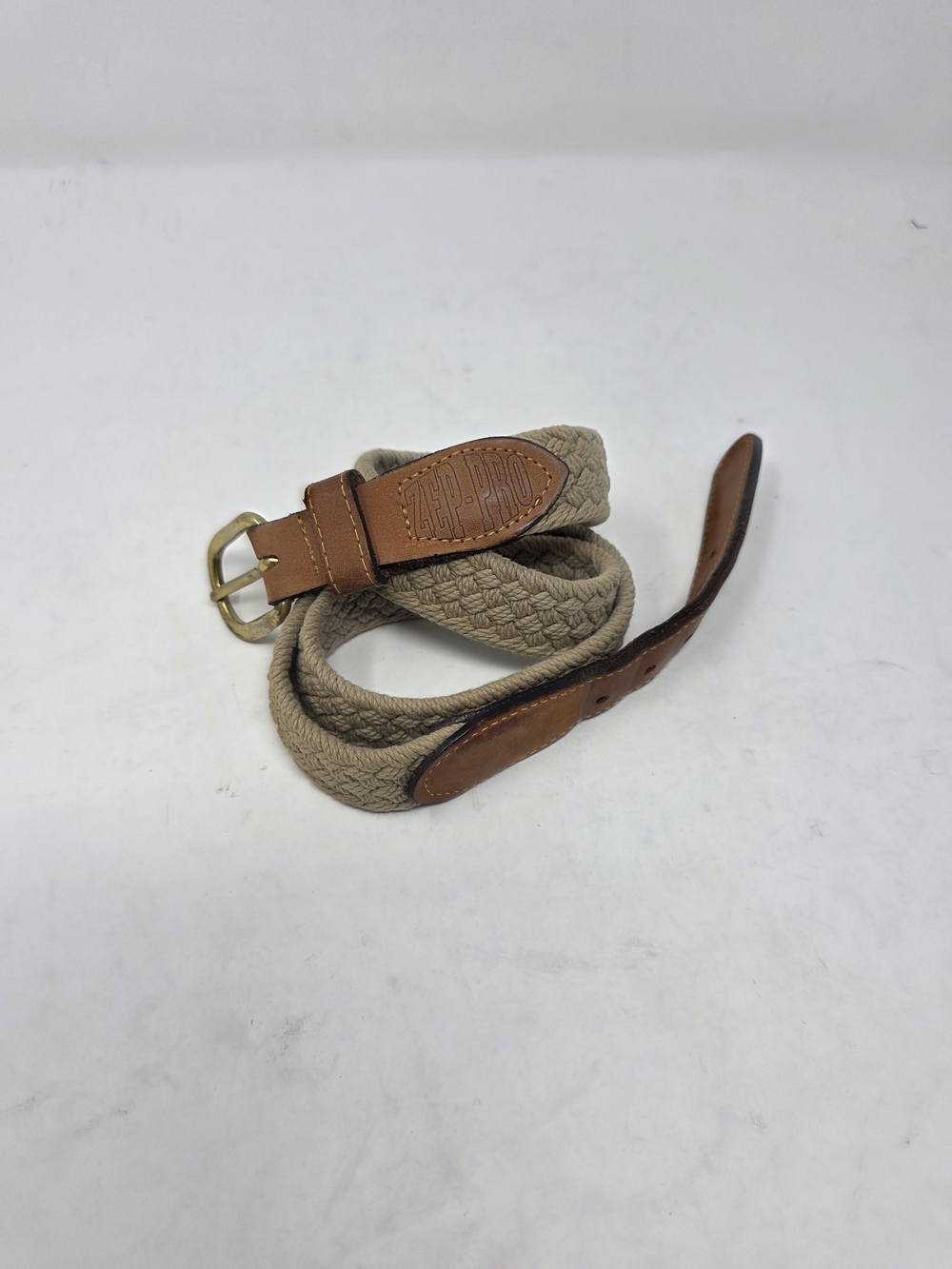 Men’s Zep-Pro braided woven belt with tan/khaki textile body, leather trim, and